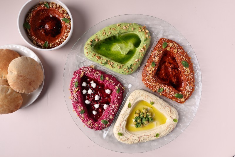 A mezze platter with dips and bread